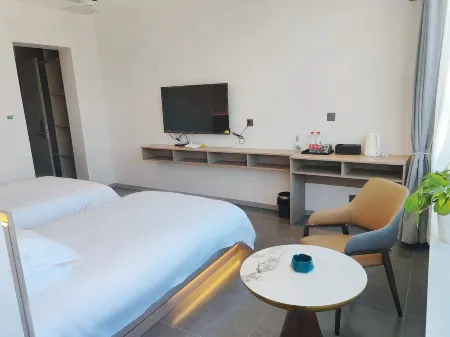 Huocheng Yunshang Huakai Homestay Отели в г. Хочен