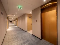 Baiyulan Business Hotel (Linqu, Weifang) - Bãi đậu xe