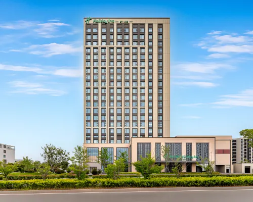 Holiday Inn Lvsi Port Qidong Hotele w: Qidong