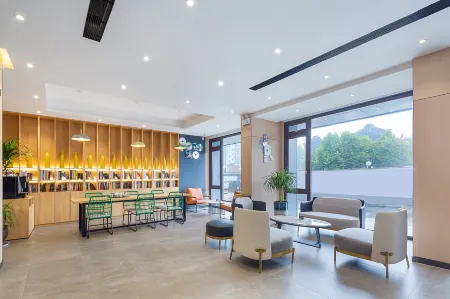 Shankee Tea Style Zhixiang Hotel (Huzhou Zhuangyuan Street Yishang Street) Отели рядом с достопримечательностью «the Tomb of Yingshi Chen»