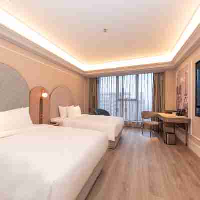 信陽東站美居酒店 Rooms