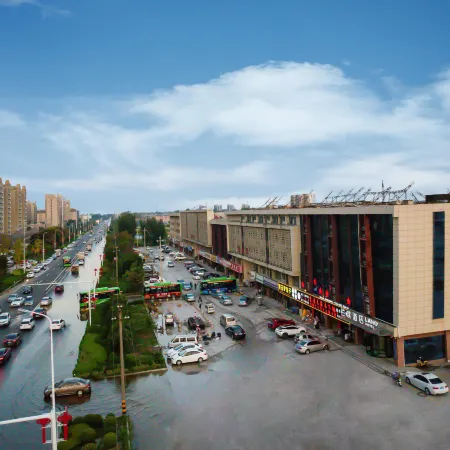 Lanou Hotel (Dongming urban and rural passenger station store) Отели в г. Дунмин