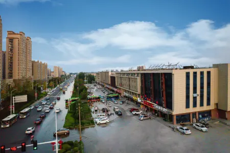 Lanou Hotel (Dongming urban and rural passenger station store) Отели в г. Дунмин