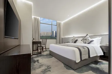 Green Oriental Hotel (Xiaogan East Railway Station) Отели в г. Сяоган