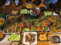 Weixi Manlaiyue Homestay - servizio colazione
