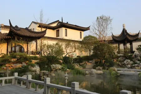 Yinyinju Отели рядом с достопримечательностью «Вайхуа Вахха Хаммэй напитки Co. ООО.»