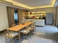 Songfengju Courtyard Hotel (Xingyi Wanfenglin Airport & High-speed Railway Station Branch)