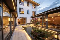 Yinqi Wuxiang Nacuo Guesthouse - bar
