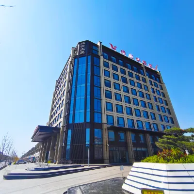 Vienna Hotel （Xinhe Yixing Building Hotel） Hotels in Xinhe