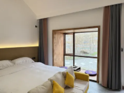 Taomanjia Persimmon Red Hoteles en Lushi