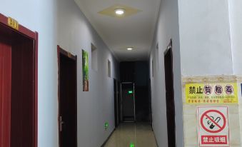 Yuanmou Aiweike Business Hotel