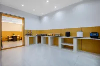 He Kou Zhenpin Guomen Hotel (He Kou Port Store) - sarapan