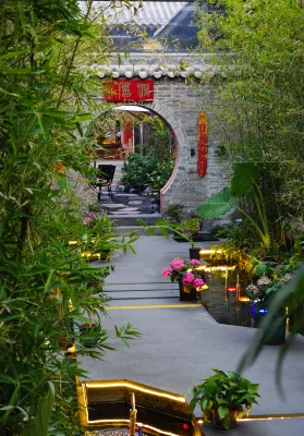 Taohua Island Jianghu Hot Spring Homestay Hotel (Xinzhou Ancient City Branch) - Romantic