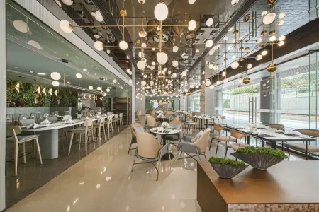 KEYPAI HOTEL（Baoneng Guangzhou Arena） Отели рядом с достопримечательностью «Siwanggang Park»