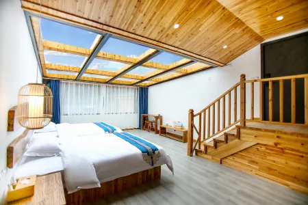 Fanjing Mountain Nanyi Homestay Отели рядом с достопримечательностью «Yamugou Scenic Area»