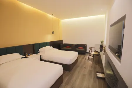 Qianshi Hostel Отели рядом с достопримечательностью «Yan'an Vocational and Technical College»