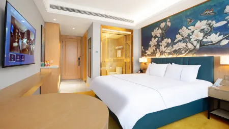 MAGNOTEL (Dengzhou Zhongzhou Avenue) Отели рядом с достопримечательностью «Nanyang Vocational College of Science and Technology»