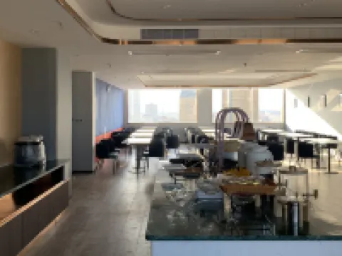 Langou Shangpin Hotel (People's Shopping Mall Shop) Hoteles en Pingyi