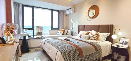 Meilu Yiju Apartment (Zhangjiagang Meilin Square Branch) Отели рядом с достопримечательностью «Zhangjiagang Campus， the City Vocational College of Jiangsu (Binjiang Avenue)»