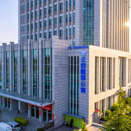 Qingdao Yunshu Nuanyi Apartment (Qianwan Port Logistics Park, Huangdao Free Trade Zone) Отели рядом с достопримечательностью «Китайская медицинская больница в новом районе западного побережья Циндао»