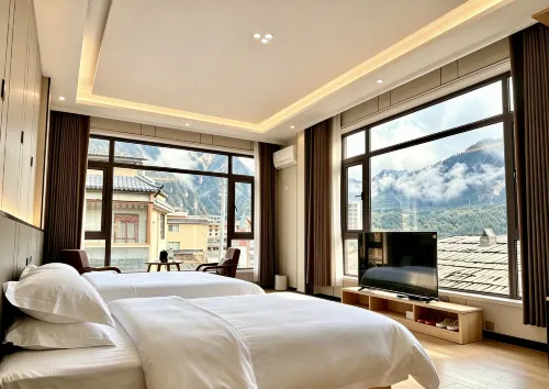 Zhagana Baimameiduo Youth Inn - فطور