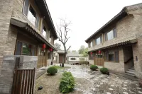 Youyouxinshe (Zhangbi Ancient Castle Scenic Area) Отели в г. Цзесю