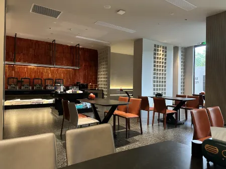 BIL Bill Travel Hotel Отели рядом с достопримечательностью «Guangdong University of Foreign Studies»