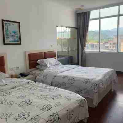 新豐梅東溫泉賓館(梅中大道分店) Rooms