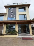 Shuyuan Xiaozhu Homestay · - parking