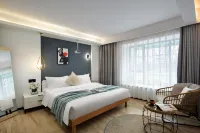 Yiju Bieyuan Hotel (Wuyi Square IFC) Hotel in zona Jiayi Memorial Residence