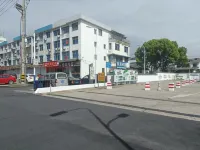 Xiuning Le Mei Hotel