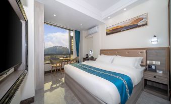 Jianghao Convenience Hotel (Hechi Huanjiang Jiangbin Road)