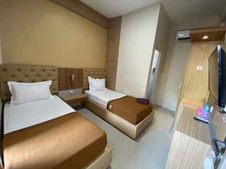 Plum Xpress Buduran Отели рядом с достопримечательностью «Superland Suncity Mall Sidoarjo»