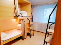 Song Ni Yi Duo Xiao Xue Hua Hostel (Zhongyang Street Ha Railway Station)