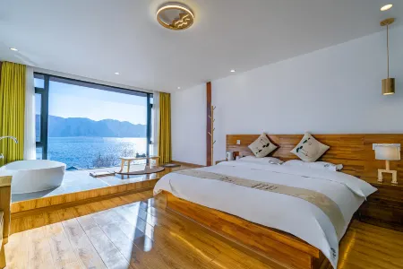 Wanghu Inn Отели рядом с достопримечательностью «Dazu Pier»