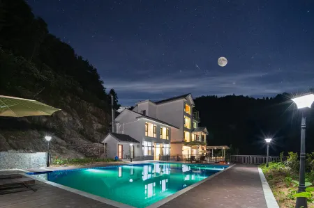 Jingya Homestay (Guilin Resource Bajiaozhai Scenic Area) Отели в г. Цзиюань