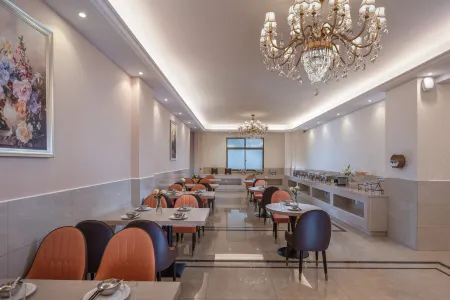 Vienna International Hotel（Ecological Zoo store ） Отели рядом с достопримечательностью «Hunan Vocational College of Science and Technology (Muyun Campus)»