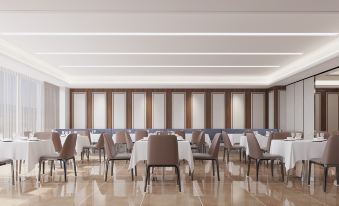 Vienna International Hotel (Xingyi Wanfenglin Airport Pingdong Square)