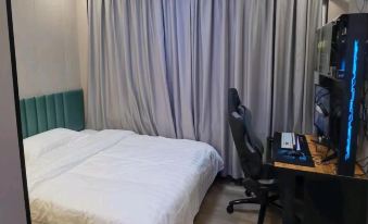 Ruguangge Electric Sports Hotel (Qufu Kongfu Shop)