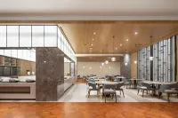 Elong Hotel (Lu'an Shuangchuang Building) - فطور