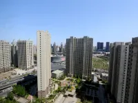 Shengya Hotel (Harbin West Railway Station Haxi Wanda Plaza) Hotel dekat Stasiun Kereta Harbin Barat