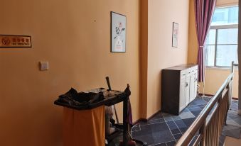 Xingping Aishang Qingshe Hotel