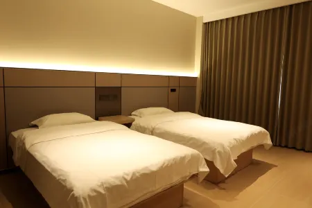 Sanhe International Hotel Отели в г. Фэйси