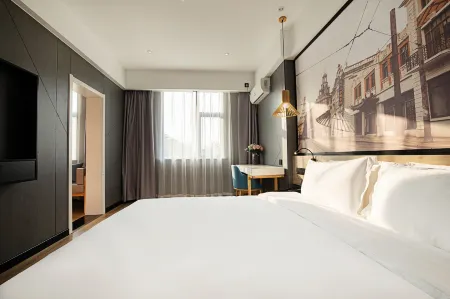 Tuke Chengshe Hotel (Gongyi Railway Station Xingyue Times Square Branch) Отели рядом с достопримечательностью «Kang Bai Wan Zhuang Yuan»