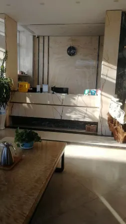 Hotels in the Tower Отели в г. Нинчэн