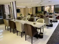 Qingyang Meilun Lizhi Hotel (Xifeng Xiaoshizi Commercial Street Shop)