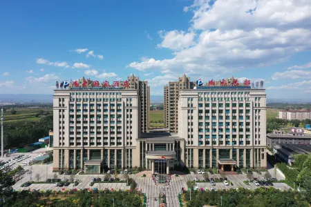 Pengfei Guobin Hotel Отели в г. Сяои