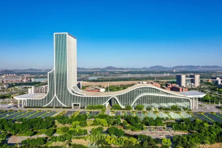 Jiujiang Hotel Отели в г. Цянань