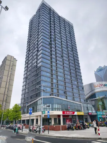 Butterfly Love Flower City Homestay (Huzhou Wuyue Square Branch) โรงแรมใกล้วัดฟาวหัว