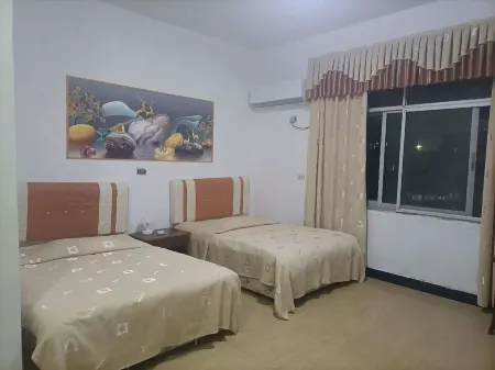 Fuyang Station Front Hotel Отели рядом со станцией Yiyang Railway Station